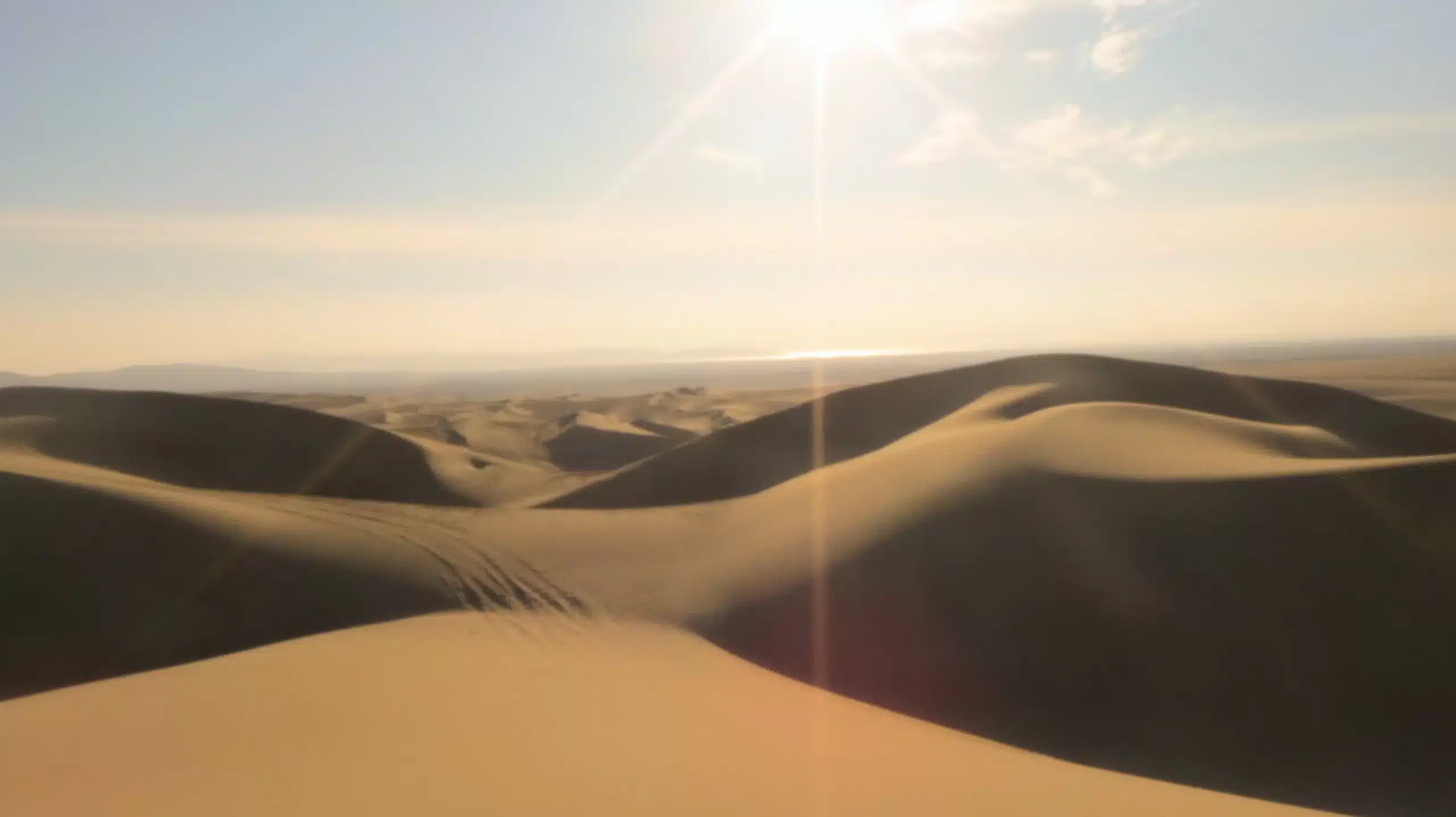 Riding dunes in the dessert of Paracas in Peru Riding dunes in the dessert of Paracas in Peru
