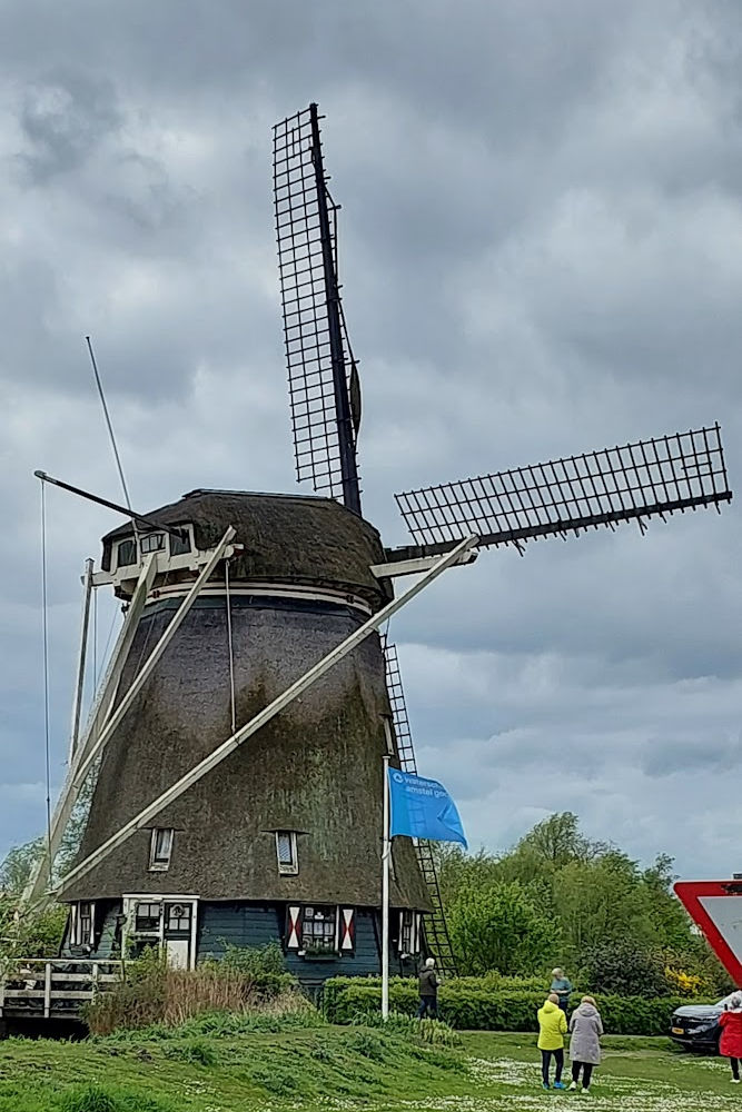 Hiking along the river Amstel in Amsterdam