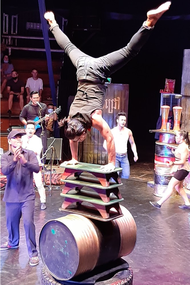 Artists performing an acrobatic act at the Phare Circus in Siem Reap, showcasing local talent