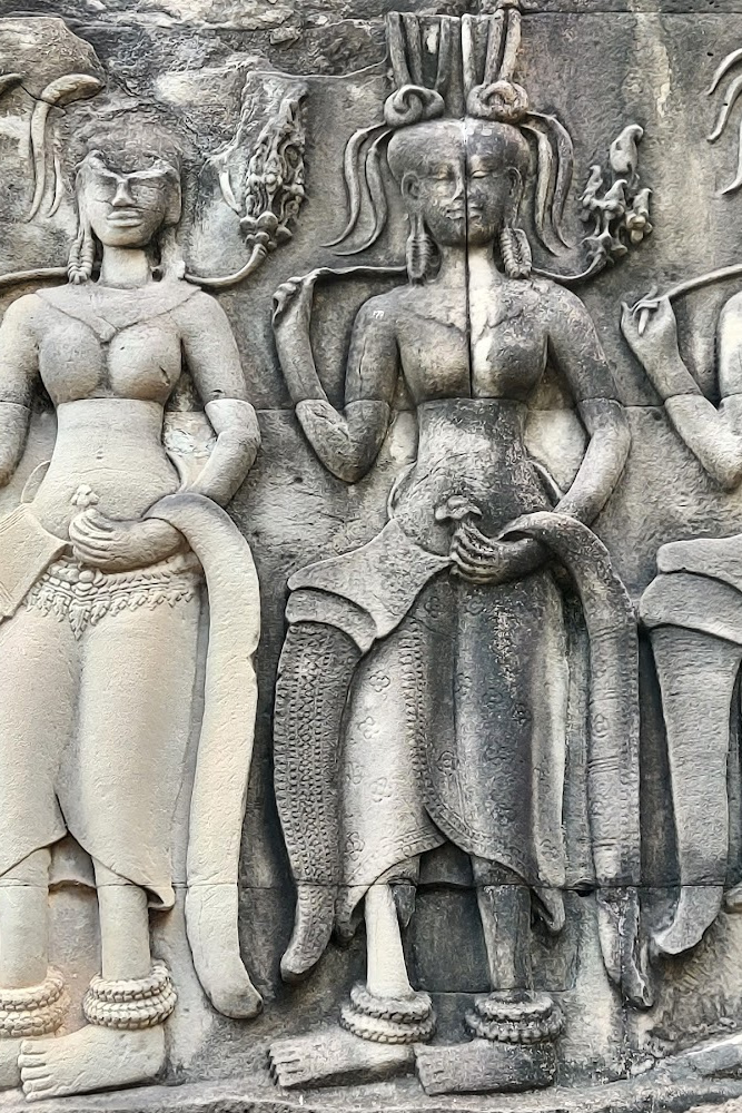 Close-up of Angkor Wat’s bas-relief carvings depicting Hindu mythology and Khmer history