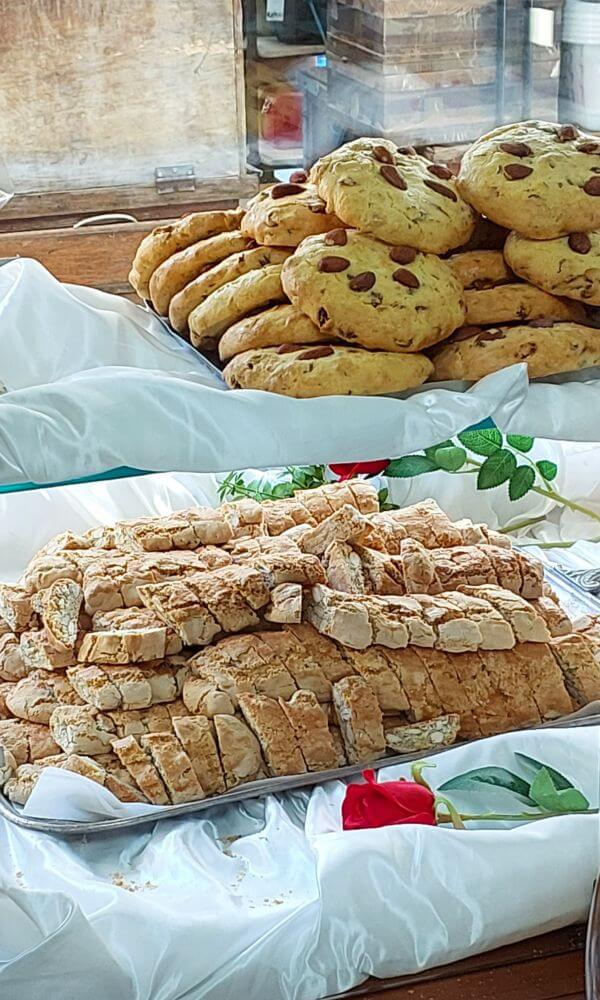 Biscotti and almond cookies on display at a local bakery in Florence, perfect for an authentic Italian breakfast.
