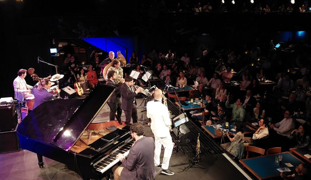 Musicians performing live at Blue Note Jazz Club in Milan with a full audience. italy itinerary 5 days