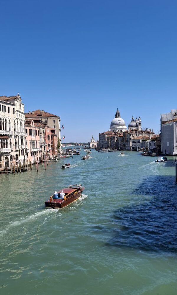 Boats on the Grand Canal with Santa Maria della Salute Basilica in the background. italy itinerary 5 days
